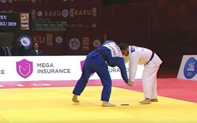 VIDEO Inedit / Un judokaa fost descalificat după ce i-a căzut telefonul pe tatami